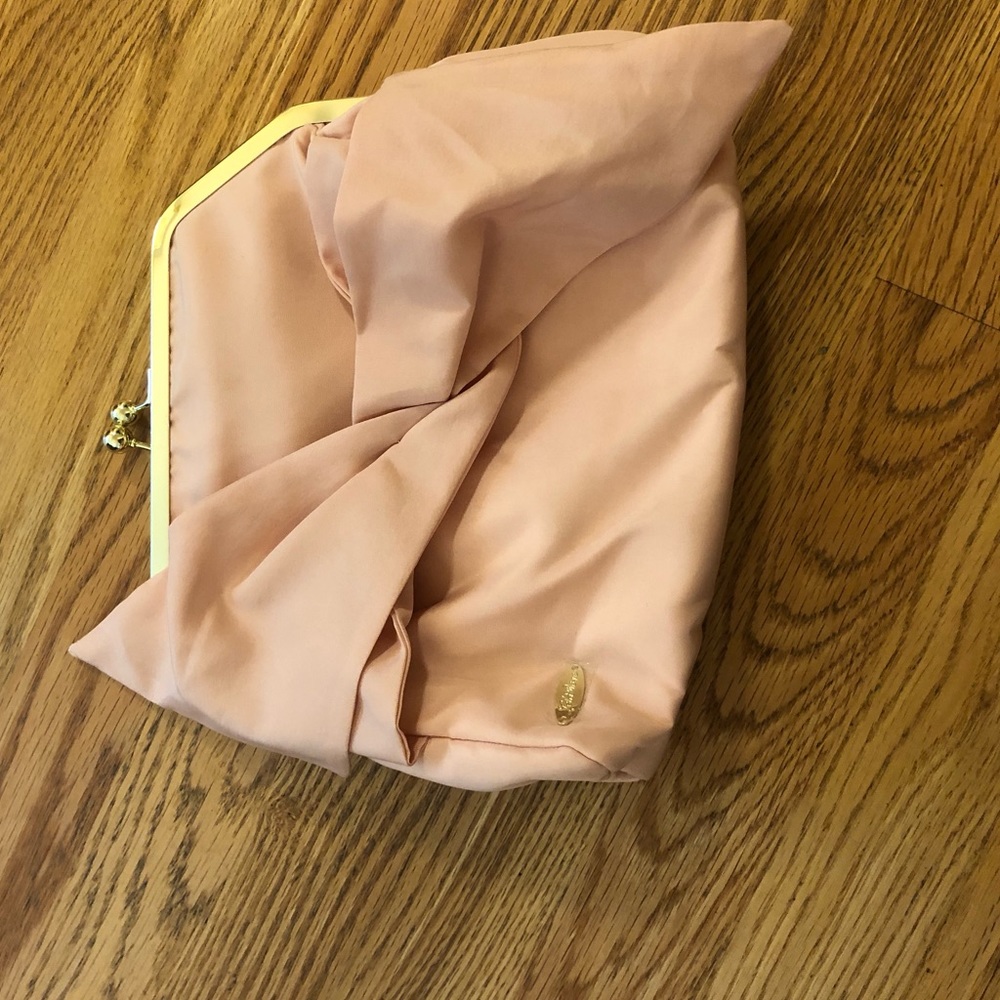 Lela Rose blush bow clutch